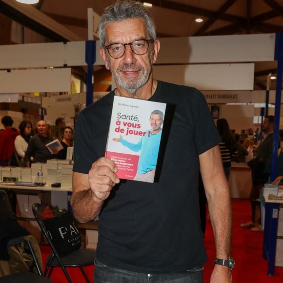 Michel Cymès, à la Halle Georges Brassens de Brive-la-Gaillarde pour la Foire du Livre de Brive , le 9 novembre 2024. © Jean-Marc Lhomer / Bestimage