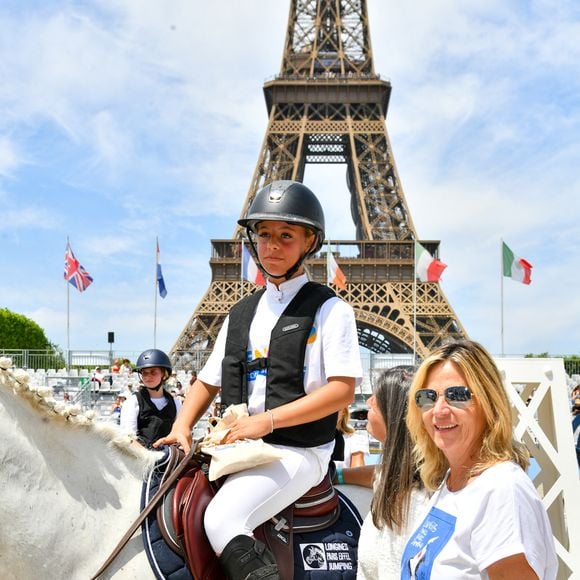 Giulia Sarkozy sur Valentine, Virginie Coupérie-Eiffel lors de la coupe Kids Cup L'Envol lors du Longines Paris Eiffel Jumping le 20 juin 2025

© Perusseau / Veeren / Bestimage