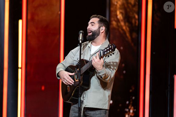 Kendji Girac, chanteur et guitariste français lors du Téléthon 2023, à Saint Denis, près de Paris, France, le 9 décembre 2023. Photo par Alexis Jumeau/ABACAPRESS.COM