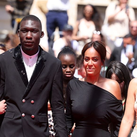 Zakaria-Tayeb Lazab, Mouctar Diawara,  Amel Bent, Lise Akoka - Montée des marches du film « Man O Bachech (Woman and child) » lors du 78ème Festival International du Film de Cannes, au Palais des Festivals à Cannes. Le 22 mai 2025
© Jacovides-Moreau / Bestimage