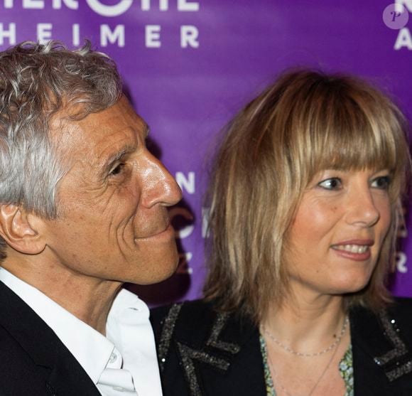 Nagui et sa femme Mélanie Page - Photocall du Gala de la Fondation Recherche Alzheimer placée sous le signe de l’émotion et du partage avec un concert unique sur le thème "2 générations chantent pour la 3ème" à l’Olympia à Paris le 17 mars 2025. © Olivier Borde - Bertrand Rindoff/Bestimage