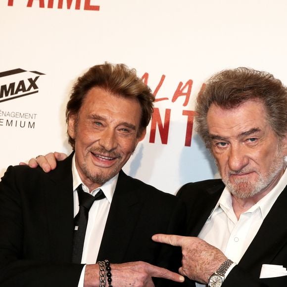 Johnny Hallyday et Eddy Mitchell - Avant-première de 'Salaud on t'aime' à l'UGC Normandie sur les Champs-Elysées à Paris le 31 mars 2014.
© DOMINIQUE JACOVIDES / BESTIMAGE