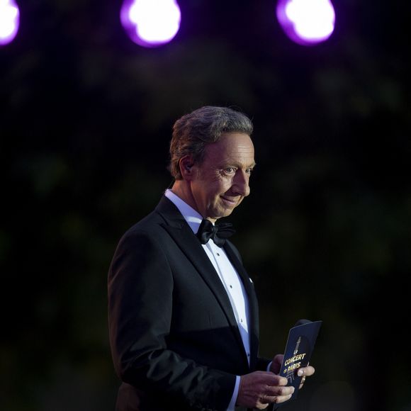 Exclusif - Stéphane Bern - 13ème édition du Concert de Paris aux pieds de la Tour Eiffel à l’occasion de la fête nationale du 14 juillet proposé par Radio France, France Télévisions, la Ville de Paris, et Électron Libre Productions. © Perusseau / Clovis / Bestimage