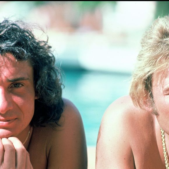 Les deux artistes ont passé beaucoup de temps avec Anthony Chaplain.

ARCHIVES - MICHEL SARDOU ET JOHNNY HALLYDAY A SAINT TROPEZ