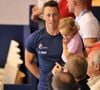 Devenu papa d'une fille prénommée Manon née en 2010 avec l'ancienne nageuse, le champion olympique s'était séparé d'elle en 2013.
Frédérick Bousquet et sa fille Manon - Laure Manaudou s'est offert sa première medaille internationale depuis quatre ans en remportant l'argent sur le 100 m dos à l'Euro-2012 en petit bassin.