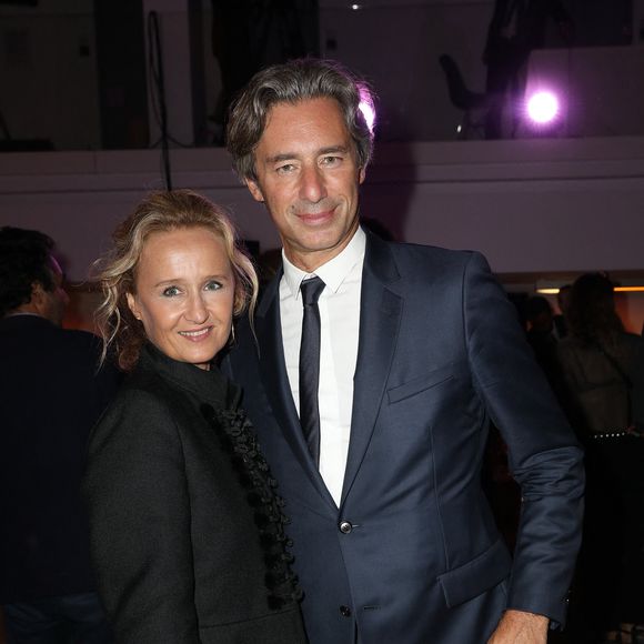 Exclusif - Caroline Roux et son mari Laurent Solly - Le professeur S.Lyonnet, président de l'Institut des maladies génétiques, et le galériste K. Mennour ont organisé la 4ème édition de la soirée "Heroes for Imagine", une grande vente aux enchères d'oeuvres d'art, animée par G.Elmaleh et dirigée par Christie's, à l'institut Imagine, 24 boulevard du Montparnasse dans le 15ème arrondissement de Paris, France, le 12 septembre 2022. © Dominique Jacovides/Bestimage