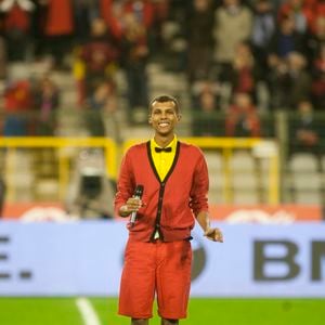 Le chanteur Stromae assiste au dernier match des "Diables Rouges", l'équipe nationale belge de football, pour les qualifications du Mondial 2014, au Stade Roi Baudouin à Bruxelles le 15 octobre 2013. Crédit Bestimage