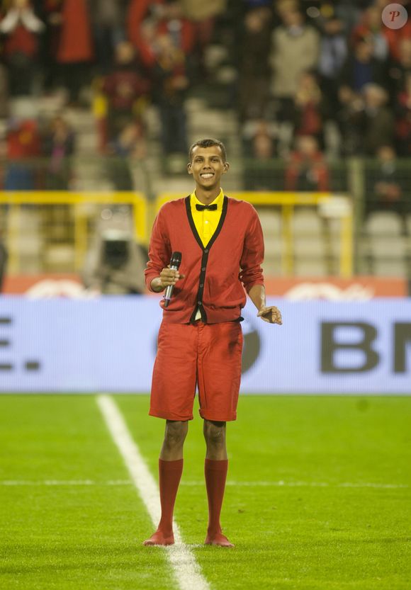 Le chanteur Stromae assiste au dernier match des "Diables Rouges", l'équipe nationale belge de football, pour les qualifications du Mondial 2014, au Stade Roi Baudouin à Bruxelles le 15 octobre 2013. Crédit Bestimage