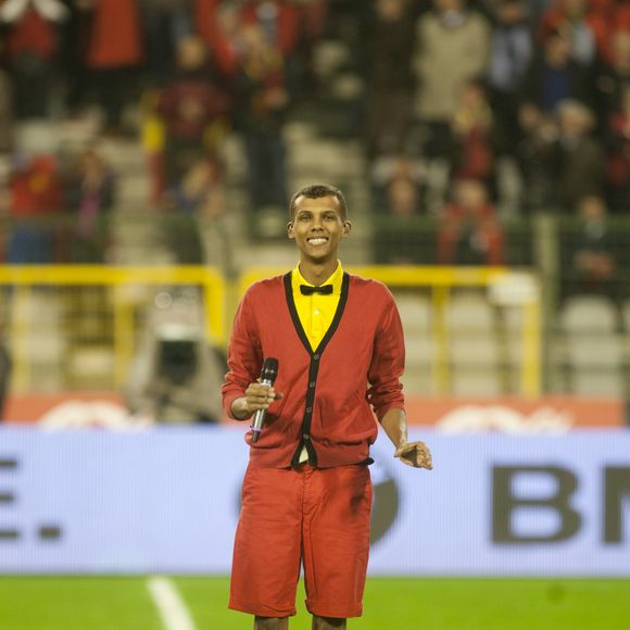 Le chanteur Stromae assiste au dernier match des "Diables Rouges", l'équipe nationale belge de football, pour les qualifications du Mondial 2014, au Stade Roi Baudouin à Bruxelles le 15 octobre 2013. Crédit Bestimage