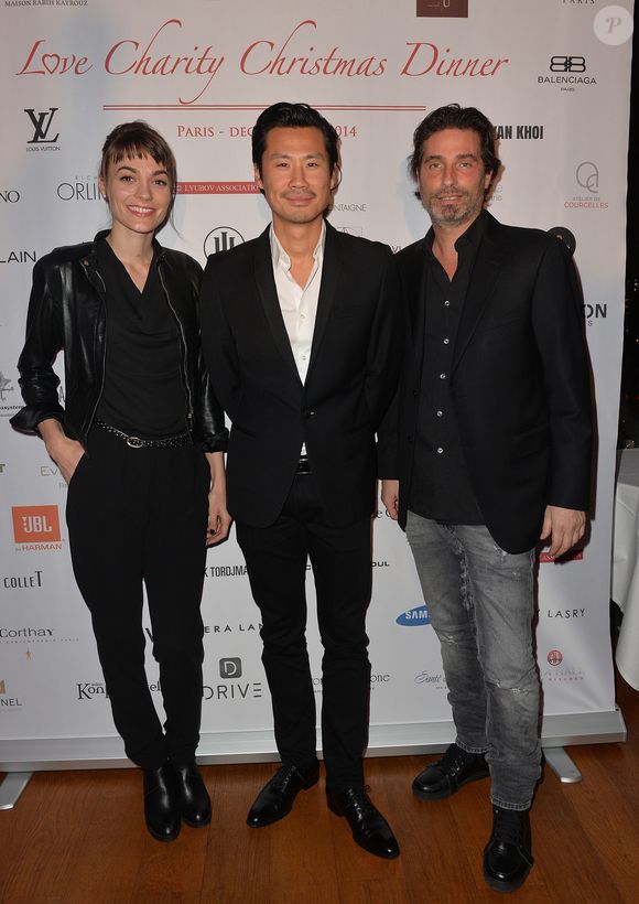 Frédéric Chau, Romane Portail et Richard Orlinski - Photocall du dîner de gala "Love Charity Christmas Dinner" organisé par l'association "Lyubov" au profit des enfants de Donetsk à la Maison Blanche à Paris, le 10 décembre 2014.
© VEEREN / BESTIMAGE