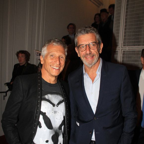 Nagui et Michel Cymes lors de la soirée de gala "Enfance Majuscule" au profit de l'enfance maltraitée à la Salle Gaveau à Paris le 7 octobre 2024. © Philippe Baldini / Bestimage