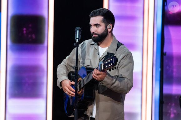 Kendji Girac, chanteur et guitariste français lors du Téléthon 2023, à Saint Denis, près de Paris, France le 9 décembre 2023. Photo par Alexis Jumeau/ABACAPRESS.COM