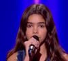 Son interprétation d’Hopelessly Devoted to You a convaincu M. Pokora et Patrick Fiori, qui ont tous deux appuyé sur le buzzer.

Lila Debbouze - Capture d'écran TF1 (The Voice)