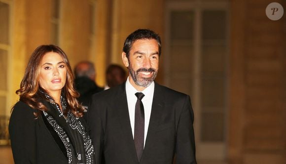 Robert Pirès et sa femme Jessica - Arrivées au dîner des 50 ans du Variétés club de France au palais de l'Elysée à Paris le 14 octobre 2021.

© Panoramic / Bestimage