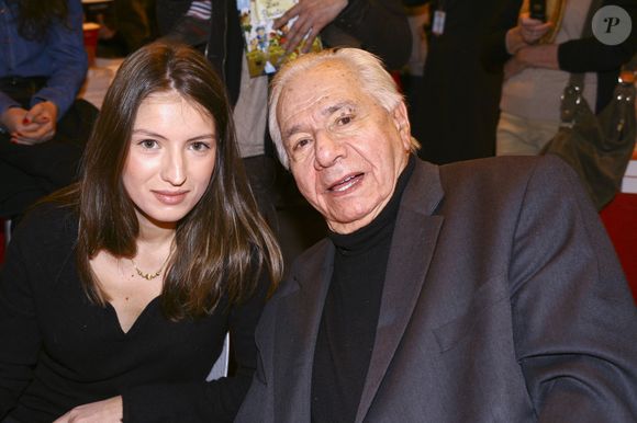 Michel Galabru et sa petite fille Sophie Galabru à la 33eme édition du Salon du Livre de la porte de Versailles a Paris le 24 mars 2013. JLPPA / Bestimage
