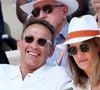 Il est marié depuis 1998 à Catherine
Julien Courbet et sa femme Catherine - Célébrités dans les tribunes des Internationaux de France de tennis de Roland Garros 2023 le 6 juin 2023. © Jacovides-Moreau/Bestimage