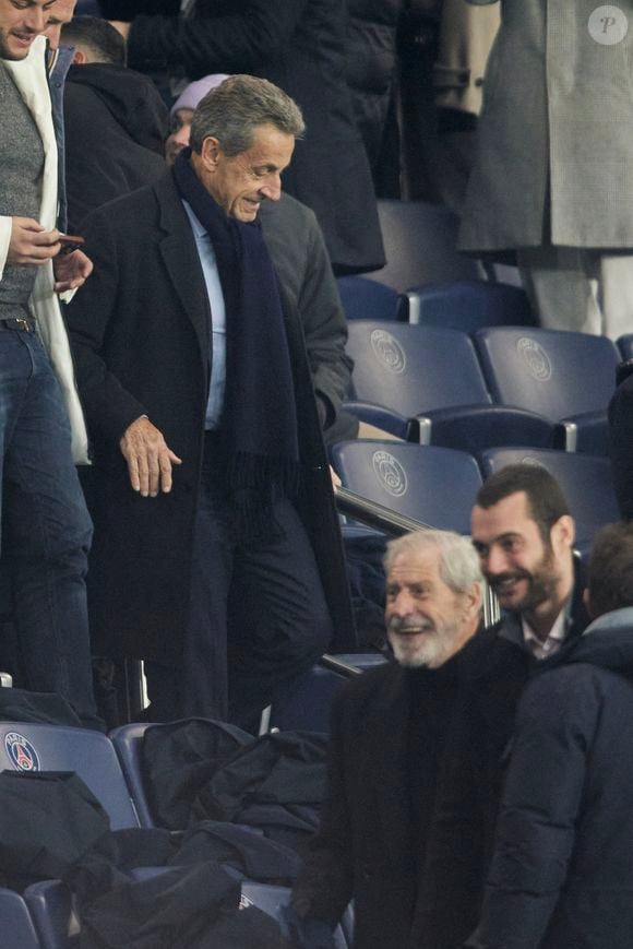 Nicolas Sarkozy, Louis Sarkozy, Jean-Claude Darmon - Célébrités dans les tribunes du match de Ligue 1 McDonald's opposant le Paris Saint-Germain (PSG) à Toulouse (3-0) au Parc des Princes à Paris le 22 novembre 2024. © Cyril Moreau/Bestimage