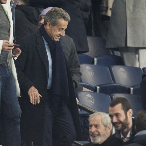 Nicolas Sarkozy, Louis Sarkozy, Jean-Claude Darmon - Célébrités dans les tribunes du match de Ligue 1 McDonald's opposant le Paris Saint-Germain (PSG) à Toulouse (3-0) au Parc des Princes à Paris le 22 novembre 2024. © Cyril Moreau/Bestimage