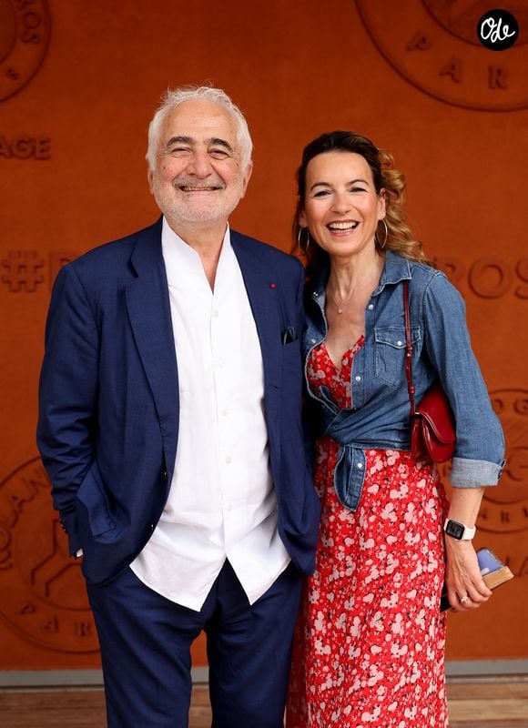 C'est à Roland-Garros, le 31 mai dernier, que leur histoire a éclaté au grand jour. Guy Savoy posait, souriant, aux côtés de Laetitia Barlerin

Guy Savoy et sa compagne Laetitia Barlerin  au photocall du village lors des Internationaux de France de Tennis de Roland Garros. Paris © Jacovides / Bestimage