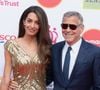 Le couple, accompagné de leurs jumeaux Ella et Alexander, faisait partie des 600 personnes contraintes de quitter leur domicile.

George Clooney, son épouse Amal Clooney et la mère de cette dernière, Baria Alamuddin, ont été aperçus assistant à la célébration du King's Trust au Royal Albert Hall, à Londres (Angleterre), le 11 mai 2026.
Backgrid UK/ Bestimage