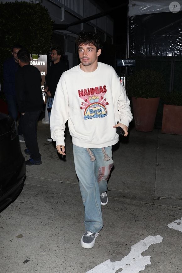 Santa Monica, CA  - EXCLUSIVE  - Monacan motorsports racing driver Charles Leclerc keeps it casual as he grabs dinner at Italian restaurant Giorgio Baldi with friends in Santa Monica.



Pictured: Charles Leclerc