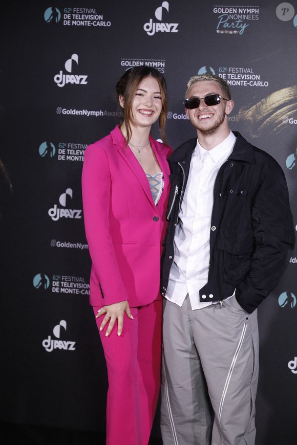Elsa Bois et Michou au photocall de la soirée des nominées 'Golden Nymph nominées party' lors du 62ème Festival de Télévision de Monte-Carlo, à Monaco, le 20 Juin 2023. 
© Denis Guignebourg/BestImage