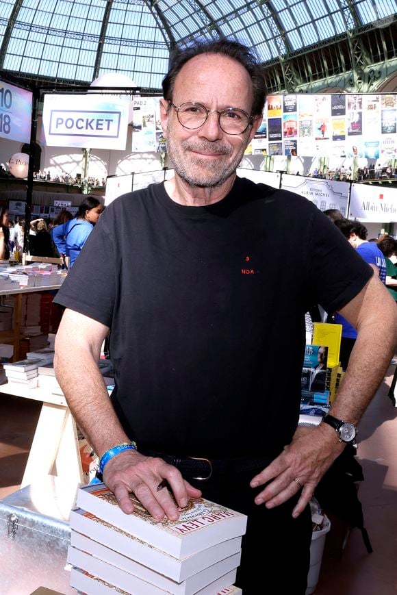 Marc Levy - Festival du Livre de Paris 2025 au Grand Palais à Paris le 11 avril 2025.
© Cédric Perrin / Bestimage