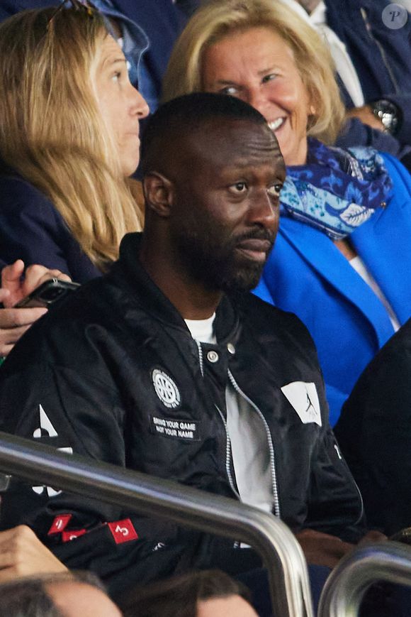 Thomas Ngijol - People dans les tribunes du match de Ligue des champions entre le PSG et le Borussia Dortmund (2-0) au Parc des Princes à Paris le 19 septembre 2023. © Cyril Moreau/Bestimage