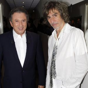 Louis Bertignac et Michel Drucker à Paris en 2011. ©Bestimage