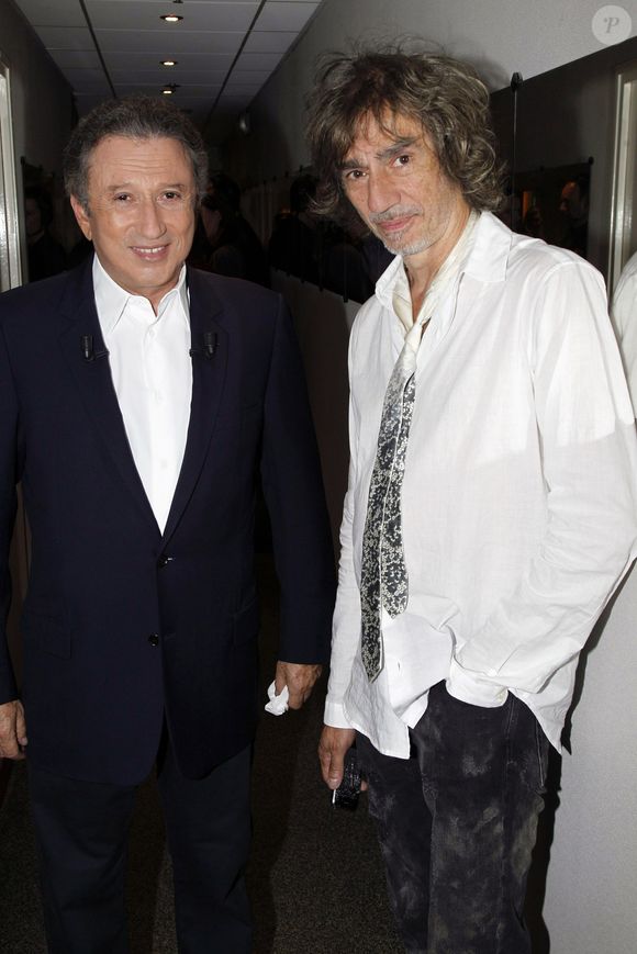 Louis Bertignac et Michel Drucker à Paris en 2011. ©Bestimage