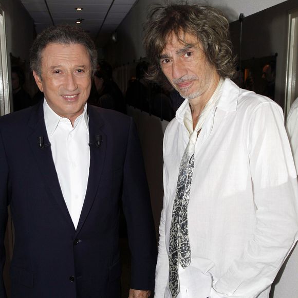 Louis Bertignac et Michel Drucker à Paris en 2011. ©Bestimage