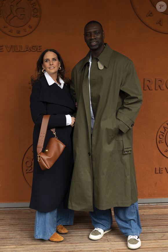 Omar Sy et sa femme Helene au village lors des Internationaux de France de Tennis de Roland Garros 2025, à Paris, France, le 7 juin 2025. © Cyril Moreau/Bestimage