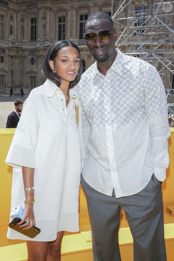 Omar Sy et sa fille Selly Sy lors du défilé de mode Homme printemps-été 2023 Louis Vuitton dans la cour Carrée du Louvre à Paris, France, le 23 juin 2022. © Olivier Borde / Bestimage