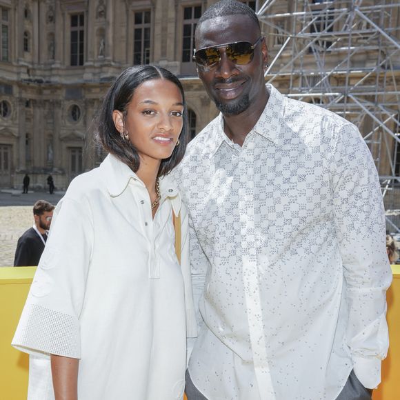 Omar Sy et sa fille Selly Sy lors du défilé de mode Homme printemps-été 2023 Louis Vuitton dans la cour Carrée du Louvre à Paris, France, le 23 juin 2022. © Olivier Borde / Bestimage