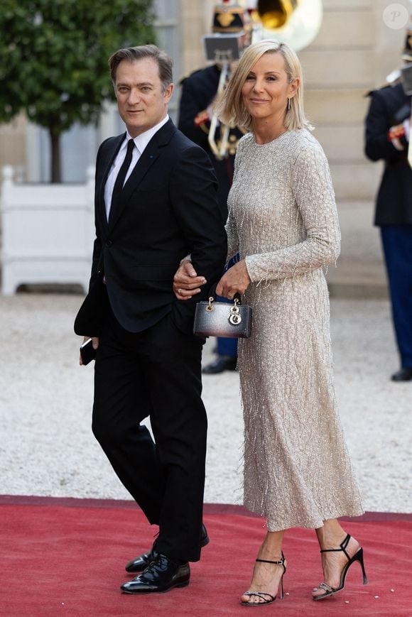 Le compagnon de la journaliste Renaud Capuçon en a dit plus

Renaud Capucon et son épouse Laurence Ferrari arrivent pour assister à un dîner d'État officiel dans le cadre de la visite d'État du président américain en France, au palais présidentiel de l'Élysée à Paris, France, le 8 juin 2024. Photo par Raphael Lafargue/ABACAPRESS.COM
