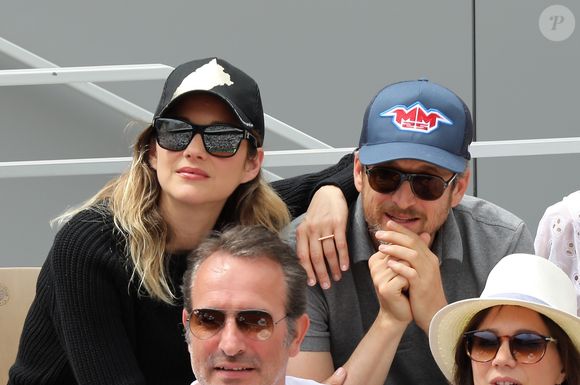 D'après une source au magazine "Voici," elle aurait des vues sur Los Angeles mais serait pour l'heure freinée par les deux enfants qu'elle a eus avec Guillaume Canet

Marion Cotillard et Guillaume Canet - People dans les tribunes lors de la finale messieurs des internationaux de France de tennis de Roland Garros 2019 à Paris le 9 juin 2019. © Jacovides-Moreau/Bestimage