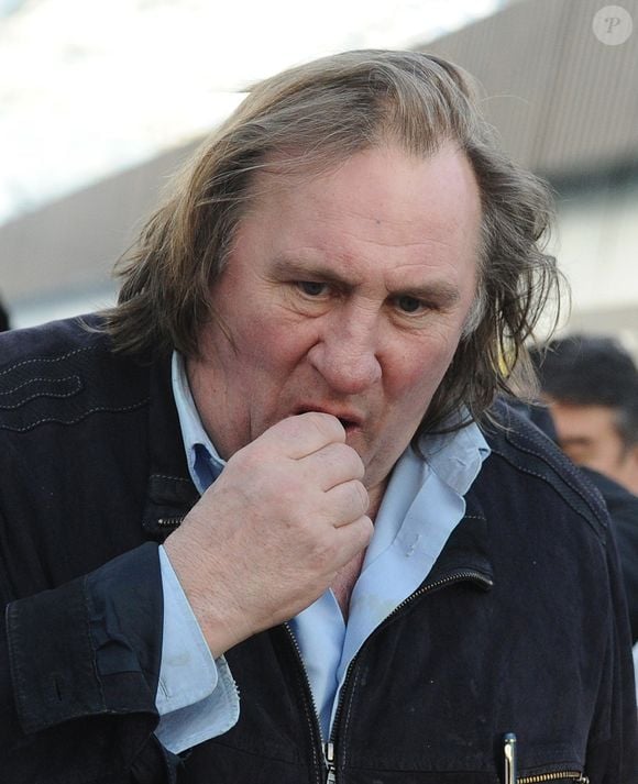 Gerard Depardieu rencontre les commercants de son quartier a Saransk lors d'une visite d'un complexe agricole le 24 fevrier 2013.
ITAR TASS / BESTIMAGE