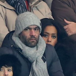 Exclusif - Amel Bent et son compagnon Patrick assistent au match de Ligue des Champions Psg - Olympiakos Le Piree au Parc des Princes a Paris le 27 novembre 2013.