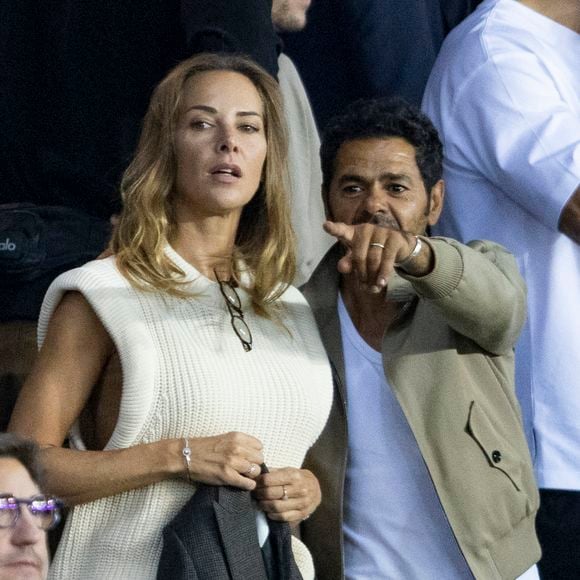 Mélissa Theuriau et son mari Jamel Debbouze au match aller de la Ligue des Champions entre le Paris Saint-Germain et la Juventus (2-1) au Parc des Princes à Paris le 6 septembre 2022. AGENCE / BESTIMAGE