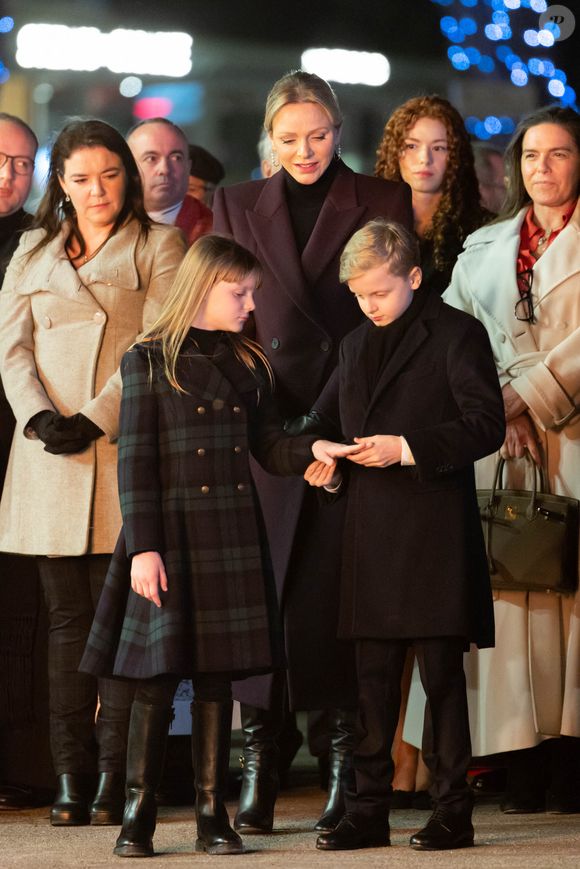 Mélanie-Antoinette de Massy, La princesse Charlène de Monaco, La princesse Gabriella de Monaco, comtesse de Carladès, Le prince Jacques de Monaco, marquis des Baux - La famille princière de Monaco lors de l'embrasement de la barque dans le cadre des célébrations de la Sainte-Dévote, Sainte Patronne de Monaco le 26 janvier 2024.

© Olivier Huitel / Pool Monaco / Bestimage