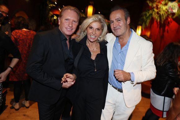 Thierry Chapon, Caroline Margeridon et Roland Perez assistent au lancement du livre 'Ma Mere, Dieu et Litzie' de Roland Perez organisé par Five Eyes Production au Buddha Bar à Paris, France, le 08 novembre 2023. Photo by Jerome Dominé/ABACAPRESS.COM