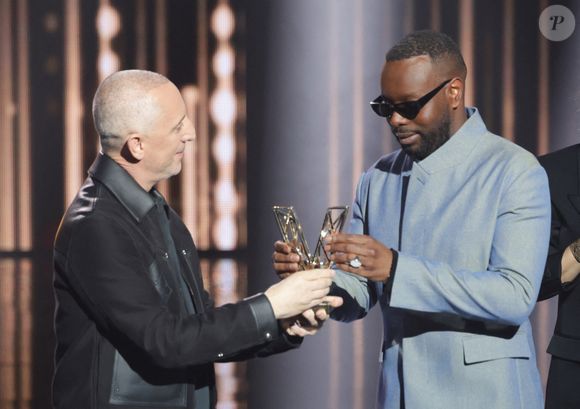 Gad Elmaleh et Gims - Cérémonie de la 40ème édition des Victoires de la Musique à la Seine Musicale à Boulogne-Billancourt, France, le 14 février 2025. © Coadic Guirec/Bestimage