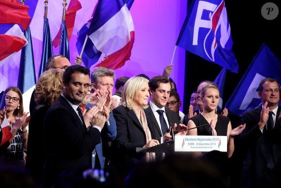 Florian Philippot, Philippe Loiseau, Nicolas Bay, Marine Le Pen, Marion Maréchal-Le Pen, Louis Aliot - Meeting entre les deux tours des élections régionales de Marine Le Pen, en présence de toutes les têtes de listes du Front National, à la salle Wagram, Paris le 10 Décembre 2015. La présidente du FN en à profité pour célébrer l'anniversaire de sa nièce Marion Maréchal-Le Pen (26 ans) devant tous les militants. © Dominique Jacovides / Bestimage