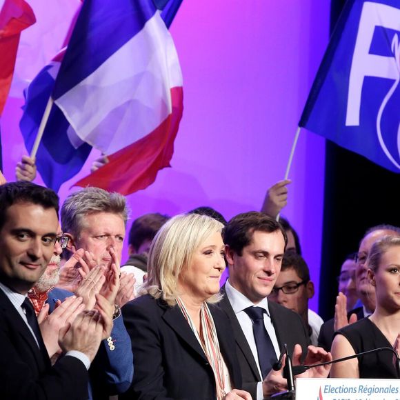 Florian Philippot, Philippe Loiseau, Nicolas Bay, Marine Le Pen, Marion Maréchal-Le Pen, Louis Aliot - Meeting entre les deux tours des élections régionales de Marine Le Pen, en présence de toutes les têtes de listes du Front National, à la salle Wagram, Paris le 10 Décembre 2015. La présidente du FN en à profité pour célébrer l'anniversaire de sa nièce Marion Maréchal-Le Pen (26 ans) devant tous les militants. © Dominique Jacovides / Bestimage