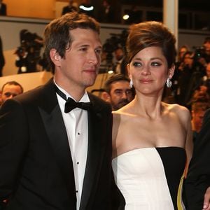 Guillaume Canet et Marion Cotillard - Descente des marches du film "Blood Ties" lors du 66ème Festival du film de Cannes le 20 mai 2013. JACOVIDES-BORDE-MOREAU / BESTIMAGE