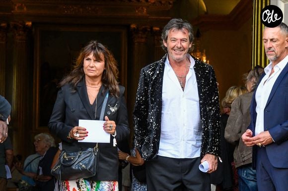 Jean-Luc Reichmann et sa femme Nathalie Lecoultre - Mariage d'Hugues Aufray et de Murielle Mégevand à l’église Saint-Vigor de Marly-Le Roy, France, le 2 septembre 2023. Agence / Bestimage
