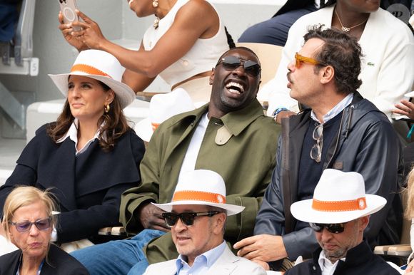 Hélène Sy, Omar Sy et Laurent Lafitte assistent au tournoi de Roland Garros 2025 le 7 juin 2025 à Paris, France. Photo par Laurent Zabulon/ABACAPRESS.COM