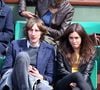 Mais l'homme de sa vie, c'est Nicolas, un passionné de musique qui travaille dans l'ombre de l'industrie du show-business...

Olivia Ruiz et son compagnon Nicolas Preschey - Jour 9 - People aux Internationaux de France de tennis a Roland-Garros le 3 juin 2013. Jacovides / Agence / Bestimage