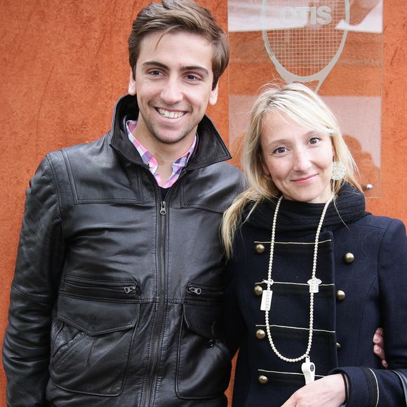 Archives - Audrey Lamy enceinte et son compagnon Thomas Sabatier lors des internationaux de tennis de France de Roland Garros à Paris, le 30 mai 2010.