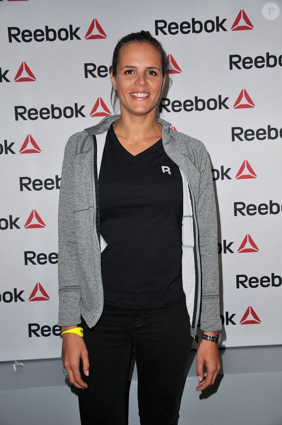 Laure Manaudou participe à l'événement d'ouverture du Concept Store Reebok à l'Avenue de L'Opéra à Paris, France, le 4 décembre 2013. Photo par Thierry Plessis/ABACAPRESS.COM